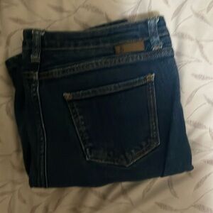 Straight legged, dark blue jeans